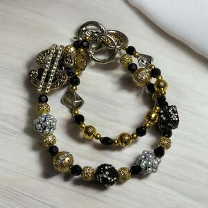 Elegant Gold and Black Money Bag Charm.